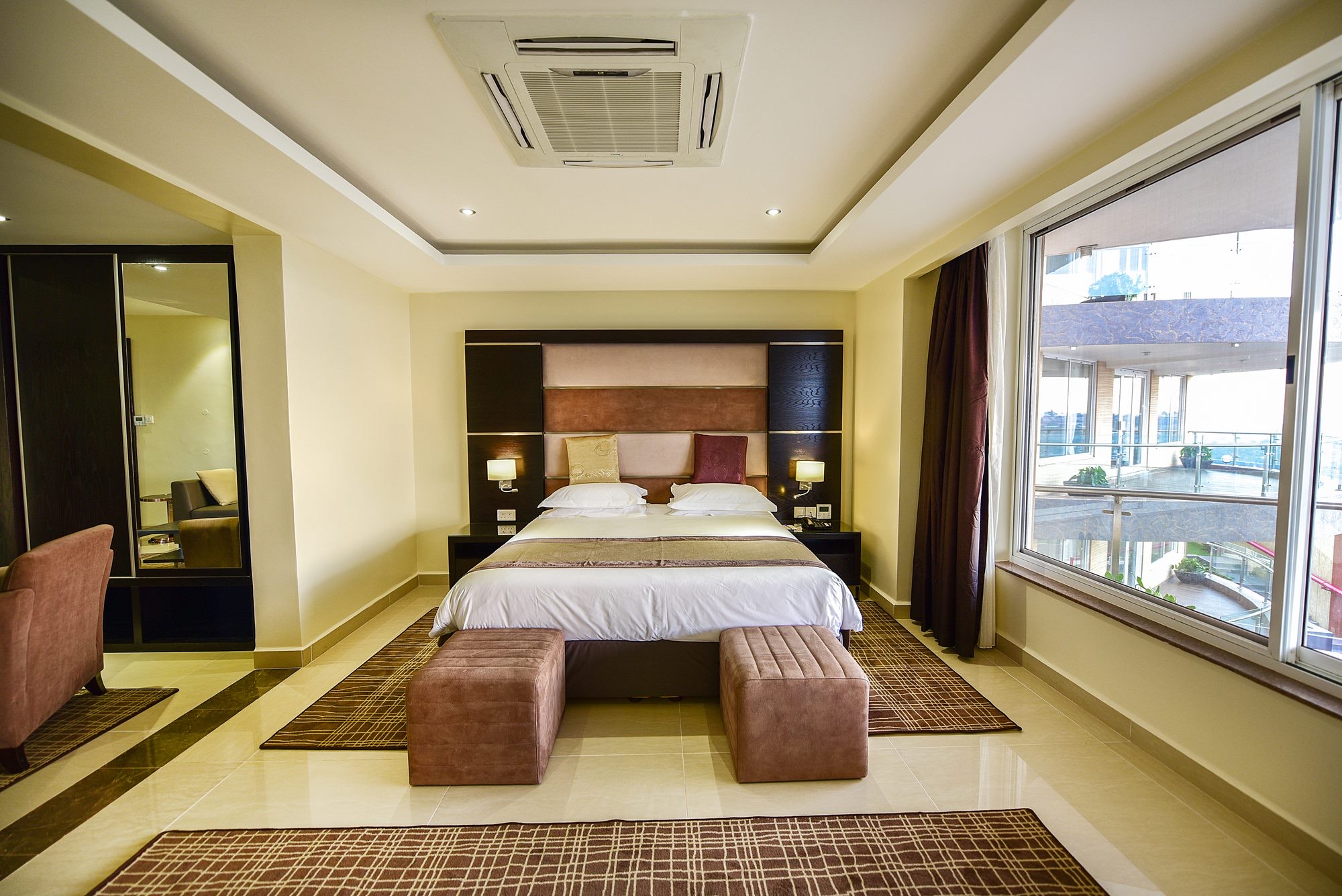 Standard Club larger guest room with a private balcony
