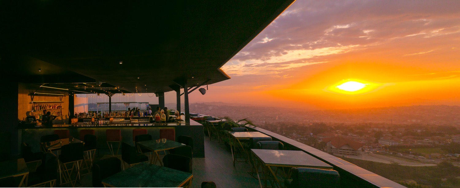 Ninety9 rooftop bar at sunset overlooking Kampala