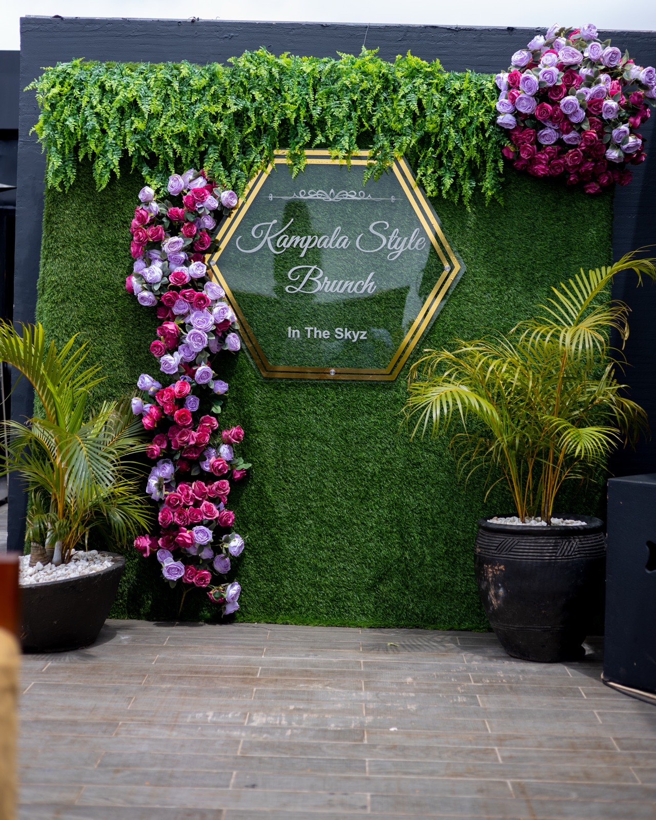 The floral 'Kampala Style Brunch, In The Skyz' photo-wall signage, April 2024