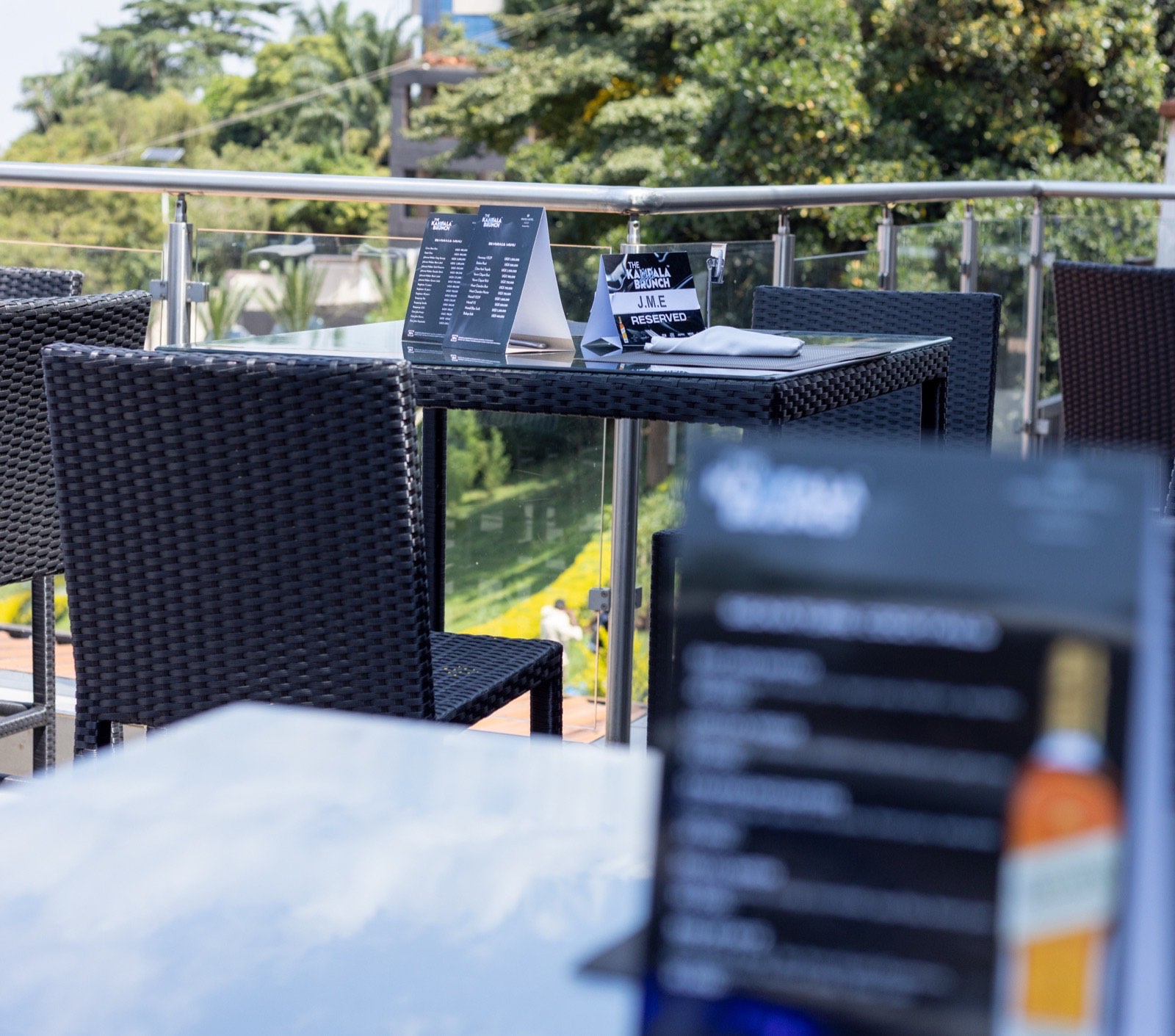 A rooftop terrace table reserved for a guest at The Kampala Style Brunch, December 2024
