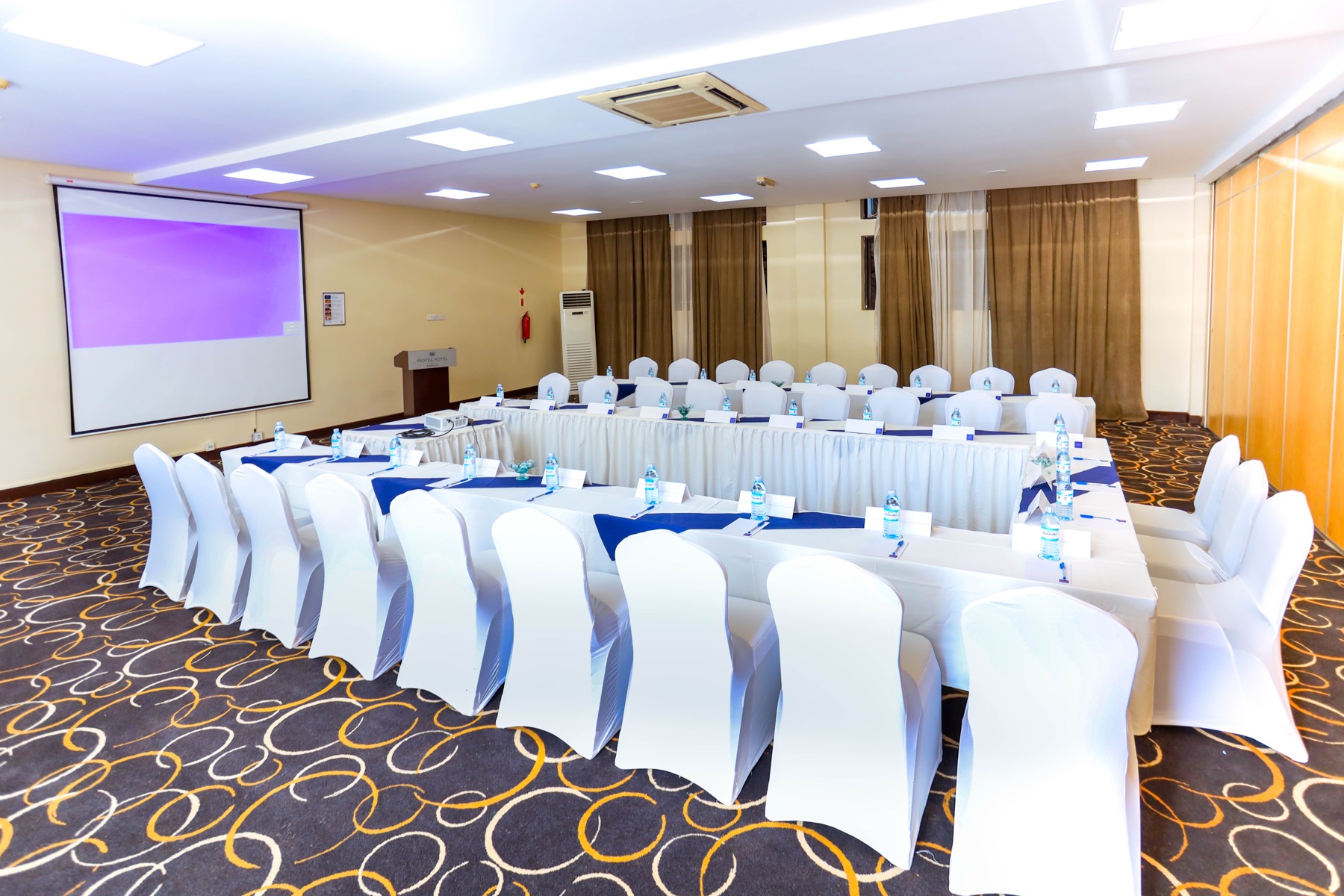 A Skyz Hotel Kampala meeting room set up U-shape style