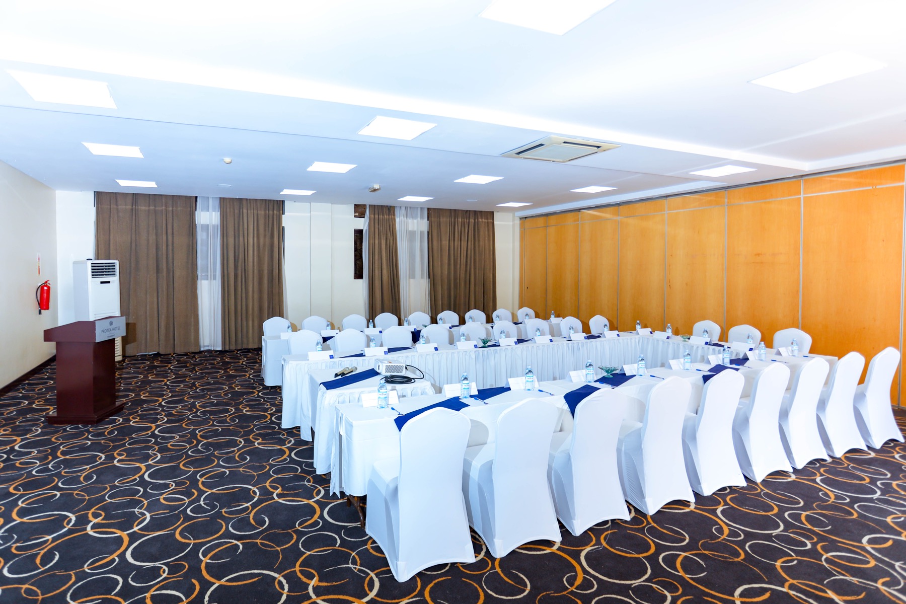 A Skyz Hotel Kampala meeting room with movable partition walls
