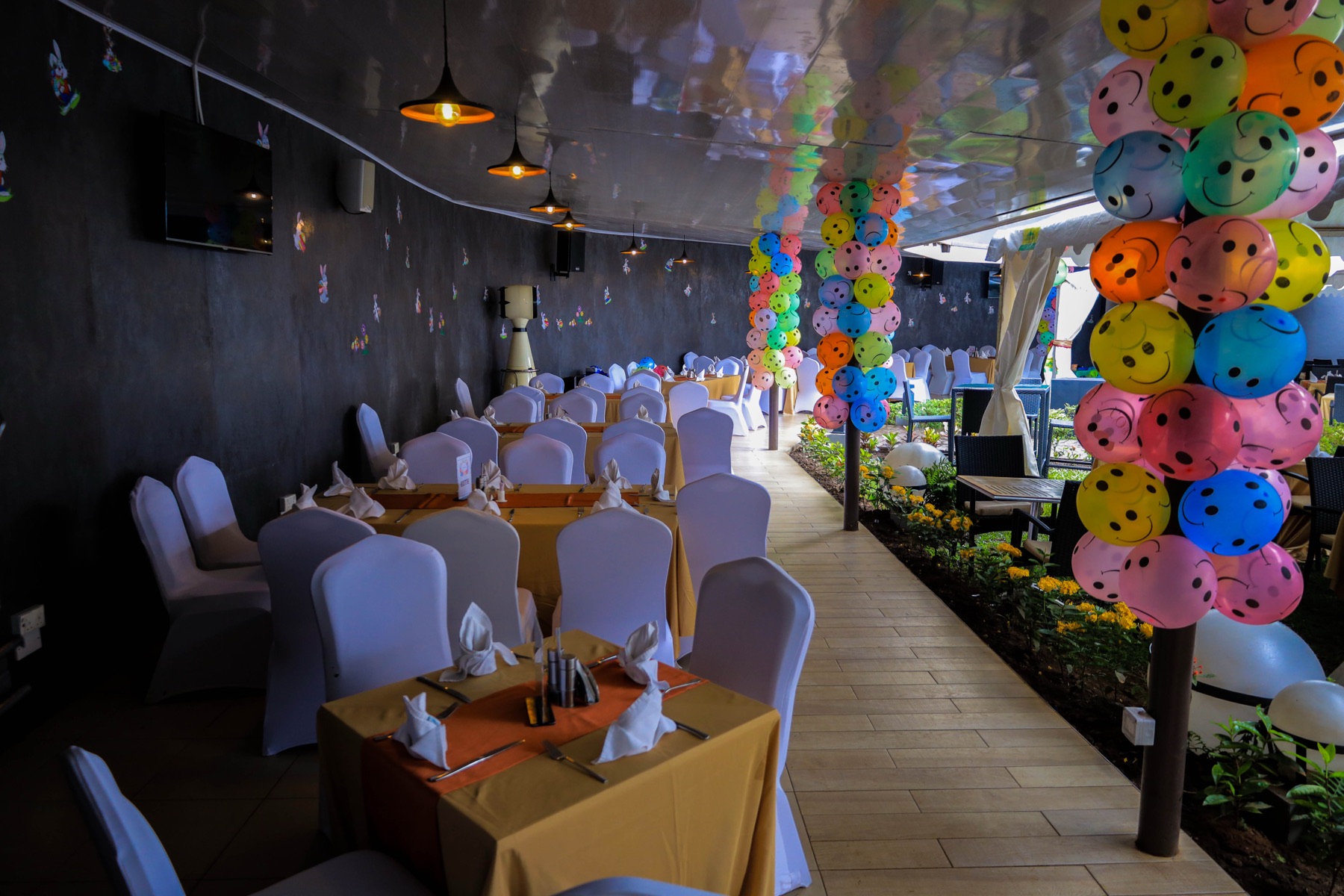 Tropicanna Poolside Restaurant covered dining area beside Tropicanna Poolside
