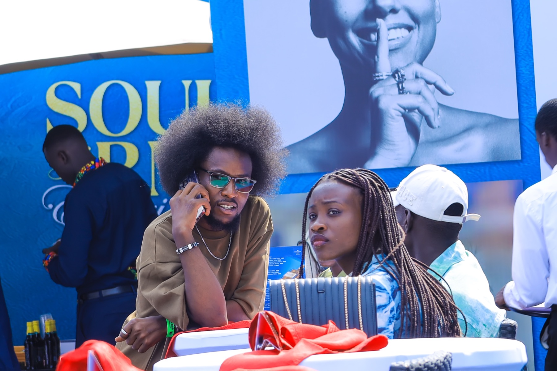 Guests beside the Soul RNB Experience branded backdrop