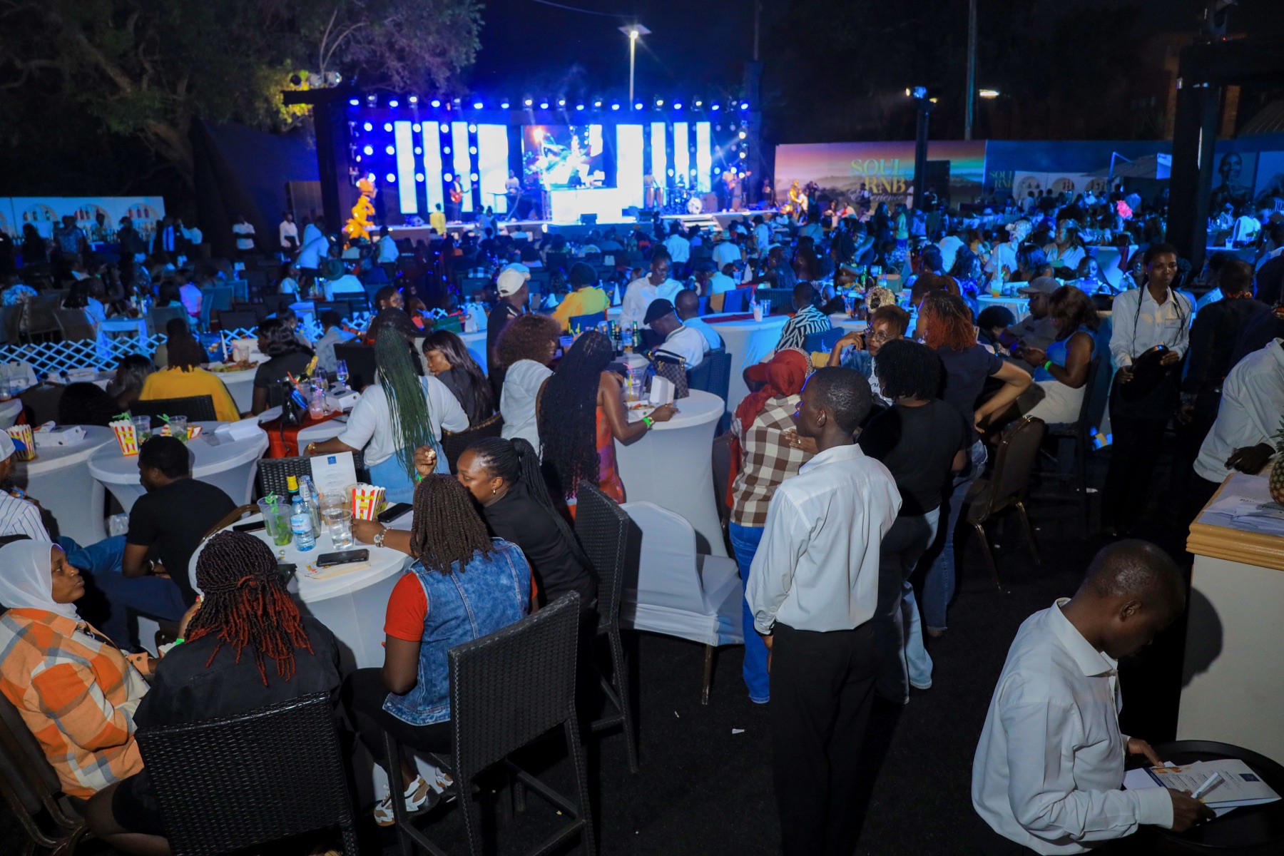 A guest dancing at night at the Soul RNB Experience