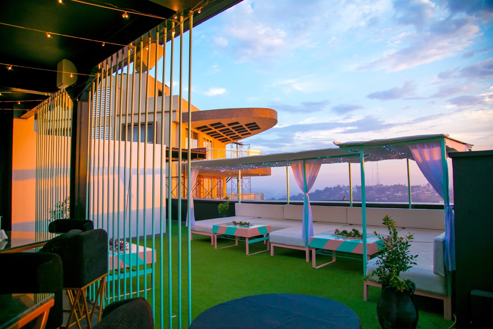 Guests on the terrace at sunset